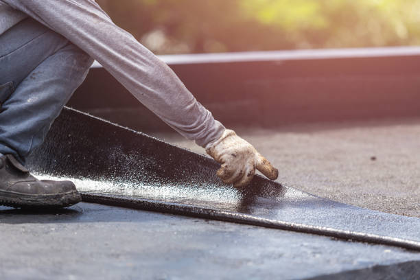 Professional Basement Waterproofing technician working in Hannibal, NY